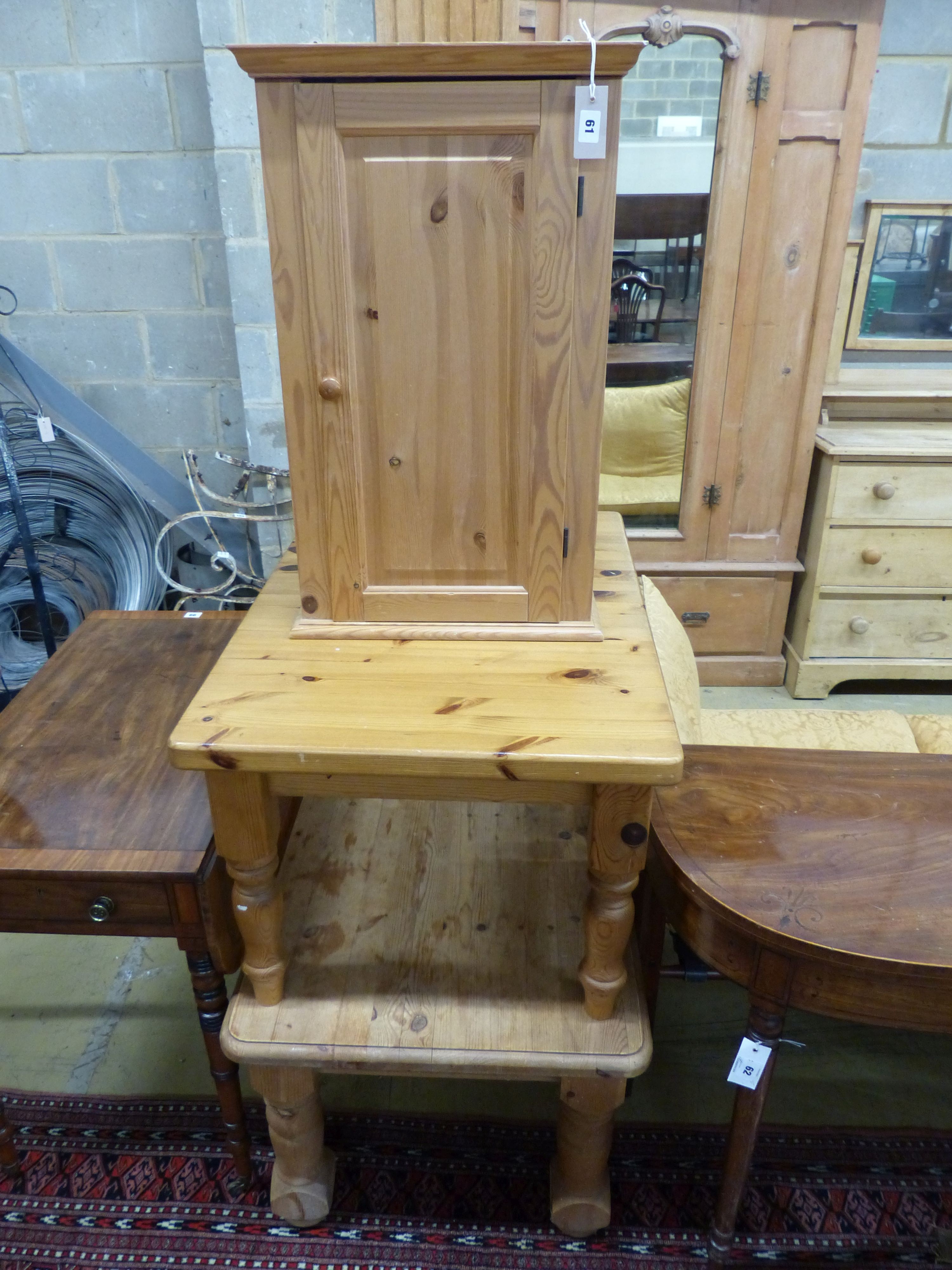 Two rectangular pine coffee tables, a pedestal and a wall cabinet